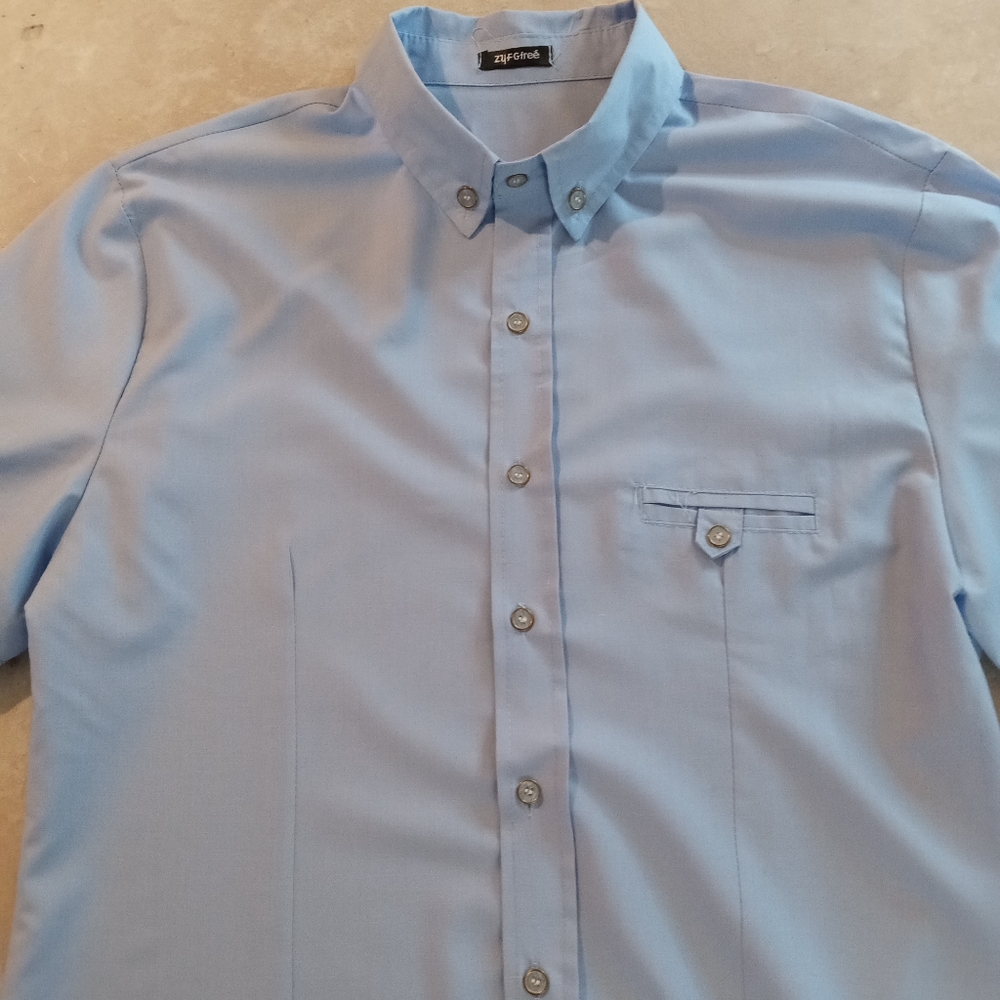Men's short sleeve button down shirt by ZYFGfree size medium never worn.New
